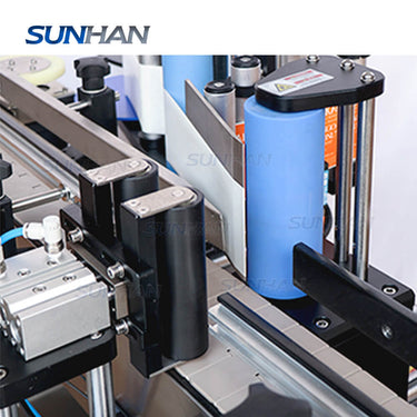 labeling structure of round bottle labeler